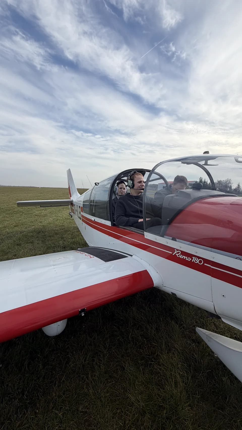 In the cockpit of a Remo 180 light aircraft